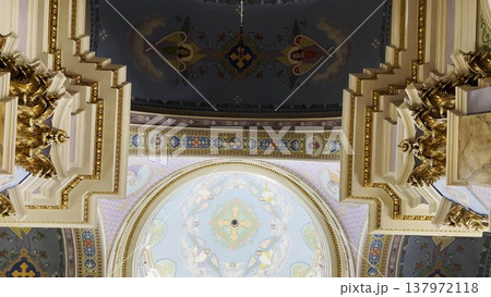 Interior view of a beautiful church showcasing ornate architecture, high ceilings and detailed decorations. Sacred space emphasizing the atmosphere of peace, spirituality and historical character Interior view of a beautiful church showcasing ornate architecture, high ceilings and detailed decorations. Sacred space emphasizing the atmosphere of peace, spirituality and historical character 137972118