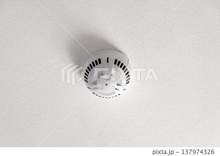 smoke detector on the ceiling 137974326
