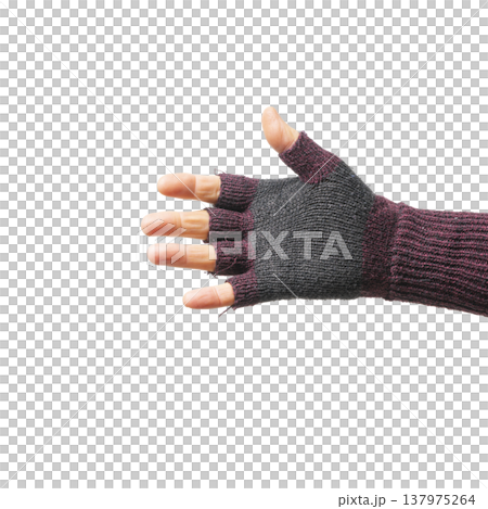 a male hand with a fingerless woolen glove a male hand with a fingerless woolen glove 137975264
