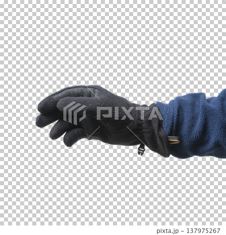 a male hand with a fingerless woolen glove a male hand with a fingerless woolen glove 137975267