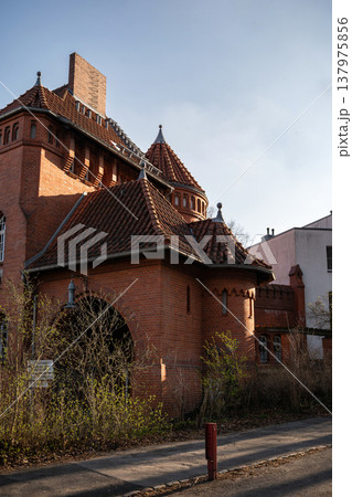 Historic Red Brick Gatehouse with Tiled Roof Historic Red Brick Gatehouse with Tiled Roof 137975856