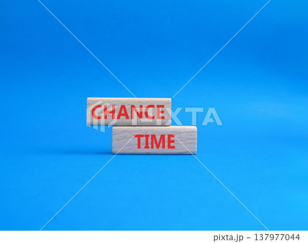 Chance Time symbol. Wooden blocks with words Chance Time. Beautiful blue background. Health and Chance Time concept. Copy space. 137977044