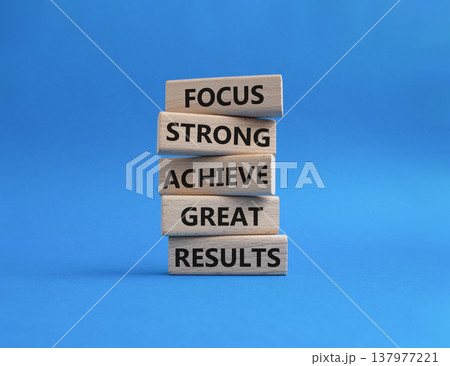 Great Results symbol. Wooden blocks with words Focus strong achieve great results. Beautiful blue background. Business and Great Results concept. Copy space Great Results symbol. Wooden blocks with words Focus strong achieve great results. Beautiful blue background. Business and Great Results concept. Copy space 137977221