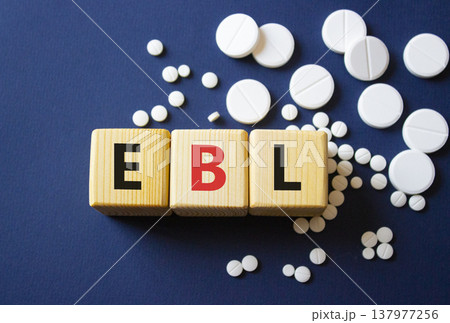 EBL symbol. Wooden cubes with words EBL estimated blood loss. Beautiful deep blue background. Healthcare and estimated blood loss concept. Copy space. EBL symbol. Wooden cubes with words EBL estimated blood loss. Beautiful deep blue background. Healthcare and estimated blood loss concept. Copy space. 137977256