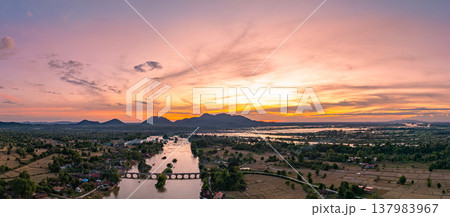 Aerial Landscape of the Red Bridge and Mekong River Valley at Sunset 137983967