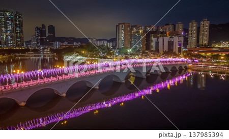 Vibrant Night Lights Illuminate Festive Bridge Over Shing Mun 137985394