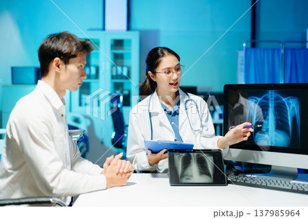 Professional doctor examining patient with stethoscope in modern clinic, healthcare consultation, medical checkup, diagnosis, trust, technology and wellness care. Professional doctor examining patient with stethoscope in modern clinic, healthcare consultation, medical checkup, diagnosis, trust, technology and wellness care. 137985964