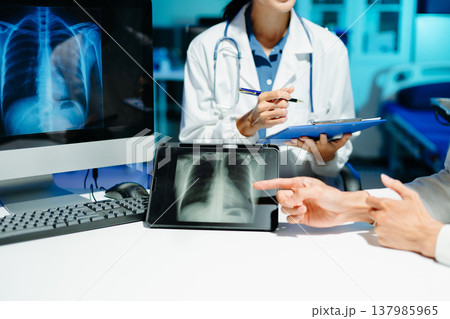 Professional doctor examining patient with stethoscope in modern clinic, healthcare consultation, medical checkup, diagnosis, trust, technology and wellness care. Professional doctor examining patient with stethoscope in modern clinic, healthcare consultation, medical checkup, diagnosis, trust, technology and wellness care. 137985965