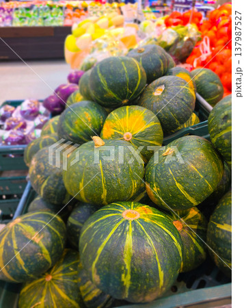 Fresh Green Kabocha in market. Squash with textured rinds and natural striping Fresh Green Kabocha in market. Squash with textured rinds and natural striping 137987527