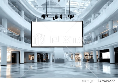 Indoor shopping mall advertising billboard. large video promotion LED screen in public space area Indoor shopping mall advertising billboard. large video promotion LED screen in public space area 137989277