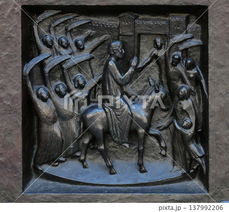 Your kingdom come - move into Jerusalem, relief on the door of the Grossmunster ("great minster") church in Zurich, Switzerland 137992206