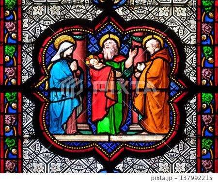 Presentation in the Temple, stained glass window in the Basilica of Saint Clotilde in Paris, France Presentation in the Temple, stained glass window in the Basilica of Saint Clotilde in Paris, France 137992215
