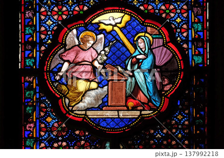 Annunciation of Mary, stained glass window in the Basilica of Saint Clotilde in Paris, France Annunciation of Mary, stained glass window in the Basilica of Saint Clotilde in Paris, France 137992218