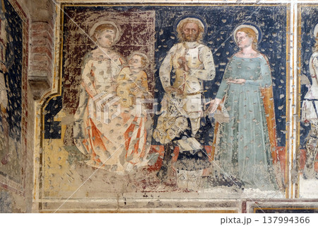 Enthroned Madonna and Child, Saints George, Catherine and a worshipper Knight, fresco in the church of San Pietro Martire in Verona, Italy Enthroned Madonna and Child, Saints George, Catherine and a worshipper Knight, fresco in the church of San Pietro Martire in Verona, Italy 137994366