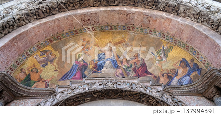 Christ in glory, bezel greater arch, the facade of the Saint Mark basilica, Venice, Italy 137994391
