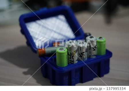 Batteries in a Blue 3D Printed Storage Box Container 137995334