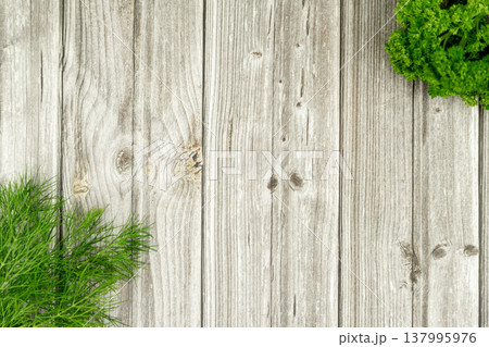 A dill branch in the corner on the table. Proper nutrition. Dietary nutrition 137995976