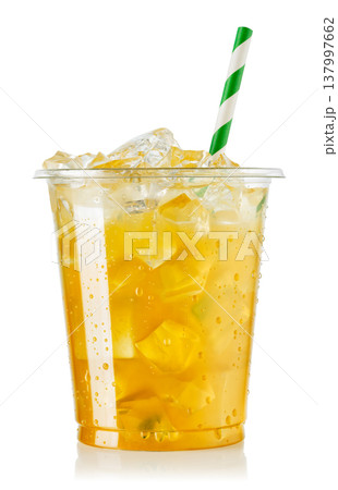 Orange juice with ice in disposable plastic glass with straw isolated on white Orange juice with ice in disposable plastic glass with straw isolated on white 137997662