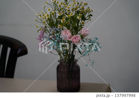 Floral Arrangement Featuring Daisies Carnations and Gypsophila 137997998