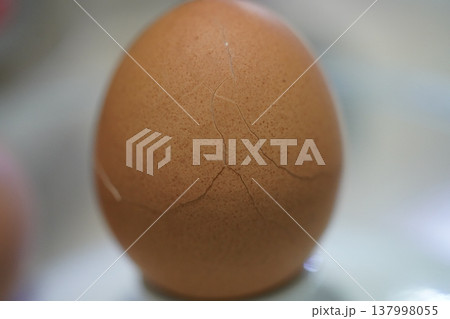 Cracked Egg Close Up Shot Cracked Egg Close Up Shot 137998055