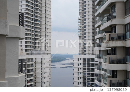 Apartment Buildings Overlooking a River View Apartment Buildings Overlooking a River View 137998089