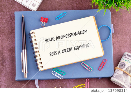 Professionalism notes on a bright notebook, blue planner, colorful supplies, and cash create a productive workspace scene 137998314