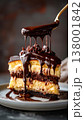 Stunning boston cream pie with layers of cake and pastry cream, topped with chocolate ganache 138001842