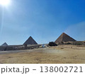 Panoramic Landscape of Giza Pyramids and Desert Sands under Bright Blue Sky 138002721