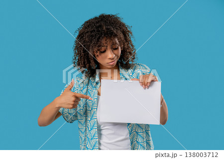 Young Sad African Woman With Blank Billboard In Hands. Copy space, Mockup Young Sad African Woman With Blank Billboard In Hands. Copy space, Mockup 138003712