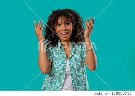 Surprised Teenage Girl Making Mind Blown Gesture On Blue Studio. Expresses Wow Surprised Teenage Girl Making Mind Blown Gesture On Blue Studio. Expresses Wow 138003713
