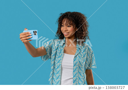 Happy African American Teenager Girl Talking Camera As Video Call, Makes Selfie 138003727