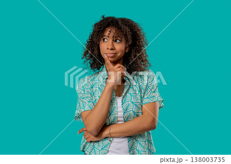 Thoughtful around teenage girl weighing options. Puzzled Lady Looking for Answer 138003735