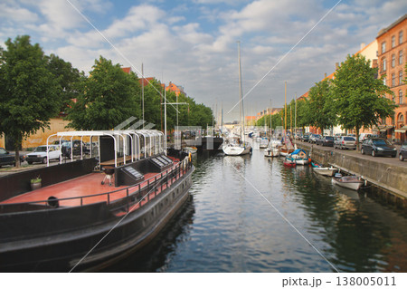 Canal with boats and historic buildings in Copenhagen with tilt-shift effect 138005011