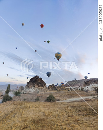 beautiful scenery flight of balloons in the mountains of Cappadocia in love valley 138005023