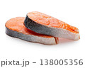 Two fresh raw salmon steaks lying on each other isolated on white background, sharpness across the entire object 138005356