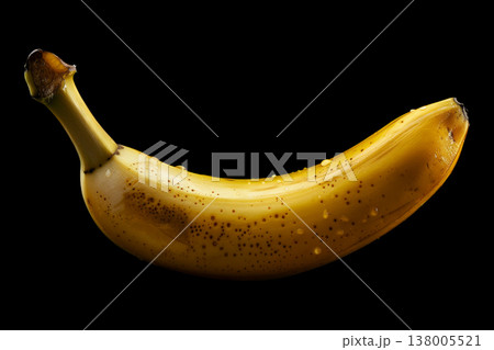 Single ripe banana with droplets isolated on black background with clipping path, concept of freshness and healthy nutrition Single ripe banana with droplets isolated on black background with clipping path, concept of freshness and healthy nutrition 138005521