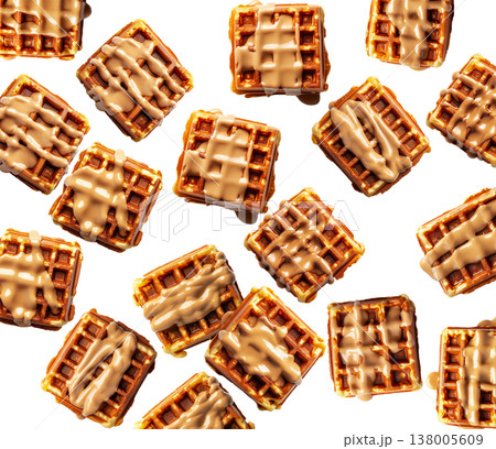 Golden brown square waffles drizzled with caramel sauce, in flat lay style isolated on white background, concept of sweet food Golden brown square waffles drizzled with caramel sauce, in flat lay style isolated on white background, concept of sweet food 138005609