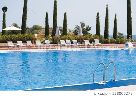 Peaceful Sunny Retreat. Calm Resort Environment Featuring Bright Sunlight And Peaceful Surroundings Peaceful Sunny Retreat. Calm Resort Environment Featuring Bright Sunlight And Peaceful Surroundings 138006275