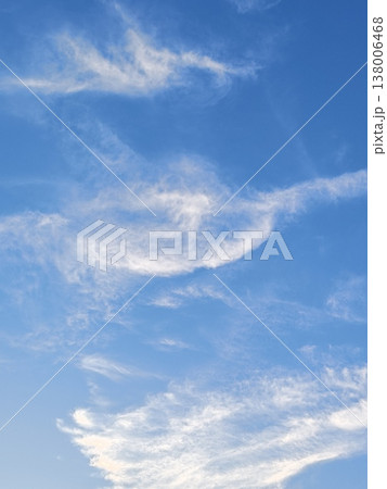 Crescent Moon in Blue Sky Among Cirrus Clouds 138006468