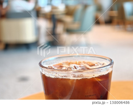 Iced Americano in Cafe with Bokeh Background 138006486
