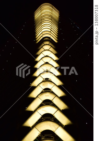 Building exterior at night. Glowing light in the border of building. Lighting decoration. 138007318