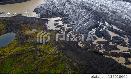 Aerial View of Icelandic Glacier, Volcanic Terrain, and Mossy Landscape 138010662