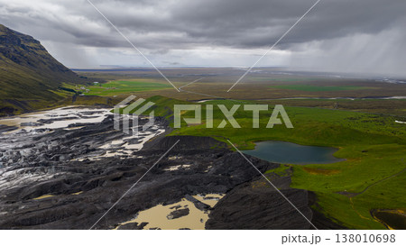 Aerial View of Iceland's Volcanic Terrain and Glacial River Aerial View of Iceland's Volcanic Terrain and Glacial River 138010698