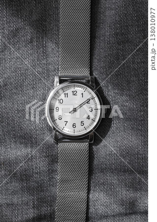 A one-hand watch in stainless steel case on a metallic mesh bracelet A one-hand watch in stainless steel case on a metallic mesh bracelet 138010977