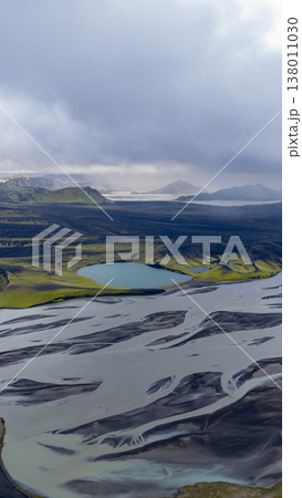 Aerial View of Braided River and Volcanic Terrain in Iceland Aerial View of Braided River and Volcanic Terrain in Iceland 138011030