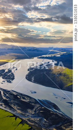 Aerial View of Glacial River and Volcanic Terrain in Iceland 138011033