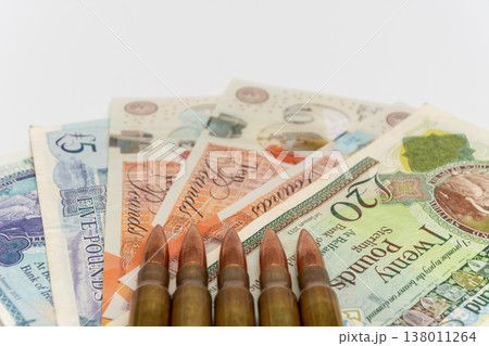 Cartridges on UK money reflect conflict impact on England finance 138011264