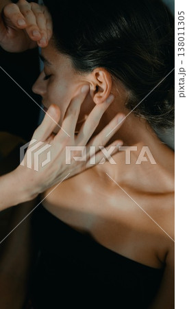 Patient receives skilled manual therapy focusing on muscle stress relief Patient receives skilled manual therapy focusing on muscle stress relief 138011305