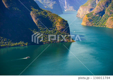 Cruise ship on fjord in Norway 138011784