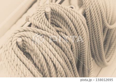 Old fashioned harbor marina sailboat ropes Old fashioned harbor marina sailboat ropes 138012695